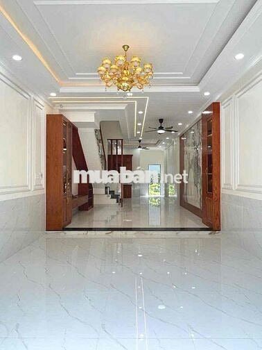 nhà 1 trệt 2 lầu gần ngã tư 550 Dĩ An, mới sạch sẽ,đường 7m đậu ô tô