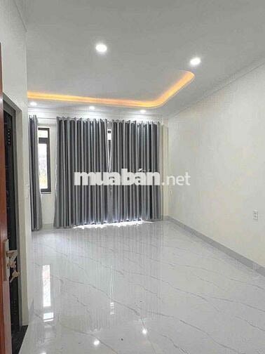 nhà 1 trệt 2 lầu gần ngã tư 550 Dĩ An, mới sạch sẽ,đường 7m đậu ô tô