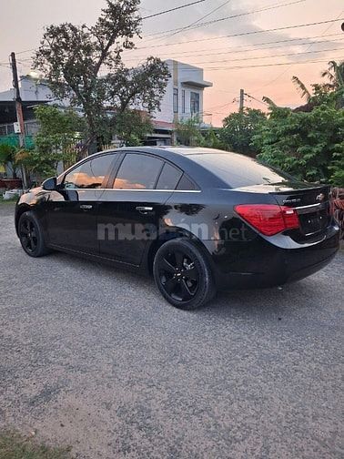 Bán xe Chevrolet Cruze màu đen, số tự động, đời 2015,.