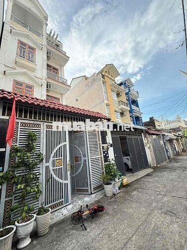 Trệt 3 lầu 5*20; 5pn sân thượng đg xe hơi gần gò Vấp