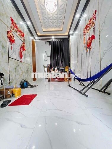 Nhà nguyên căn 4 phòng ngủ có sân thượng, hẻm xe hơi đg Lê Văn Lương