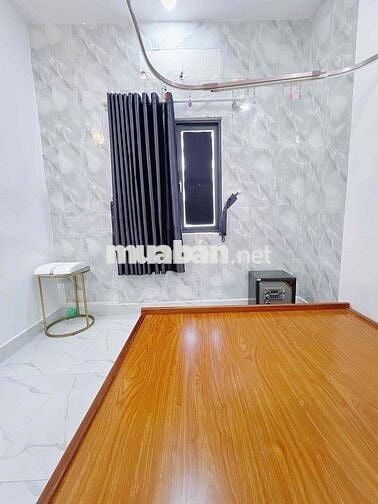 Nhà nguyên căn 4 phòng ngủ có sân thượng, hẻm xe hơi đg Lê Văn Lương