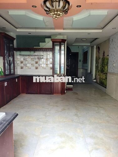 Nhà 4 lầu MT đường ĐHT giáp song hành 5x20m giá 10ty800tr TL