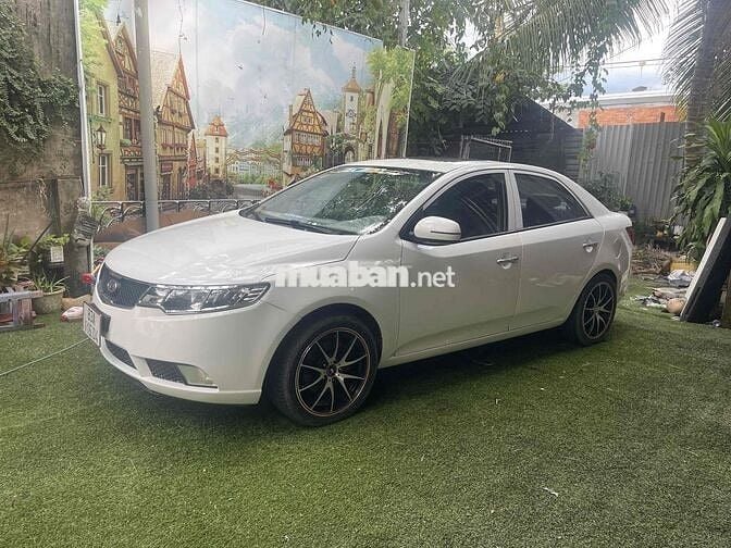 Kia Cerato 2010 1.6 AT - 123456 km