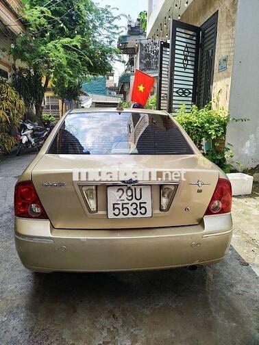 Đổi xe cần bán ford laser 2004 GHIA 1.8 AT.