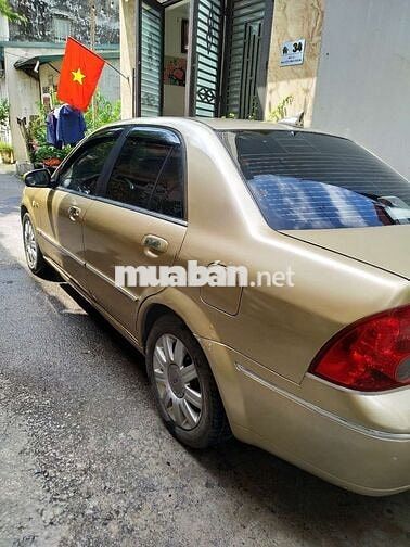 Đổi xe cần bán ford laser 2004 GHIA 1.8 AT.