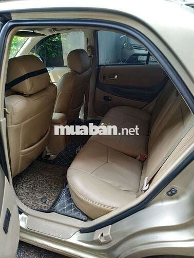 Đổi xe cần bán ford laser 2004 GHIA 1.8 AT.