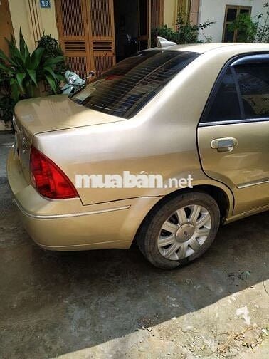 Đổi xe cần bán ford laser 2004 GHIA 1.8 AT.