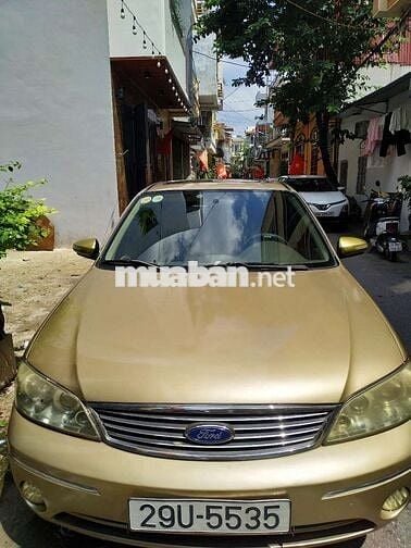 Đổi xe cần bán ford laser 2004 GHIA 1.8 AT.