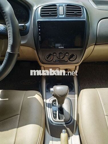 Đổi xe cần bán ford laser 2004 GHIA 1.8 AT.