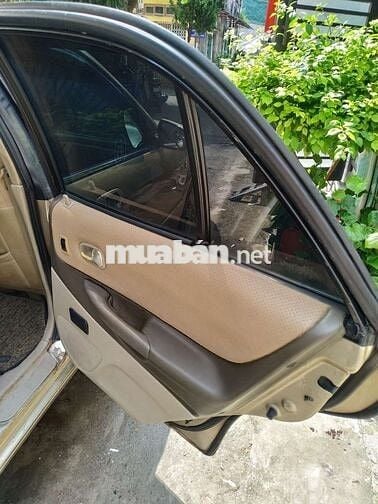 Đổi xe cần bán ford laser 2004 GHIA 1.8 AT.