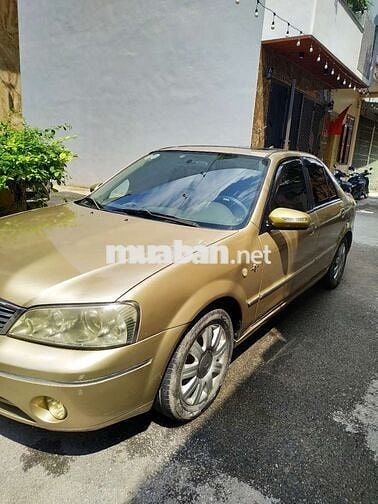 Đổi xe cần bán ford laser 2004 GHIA 1.8 AT.