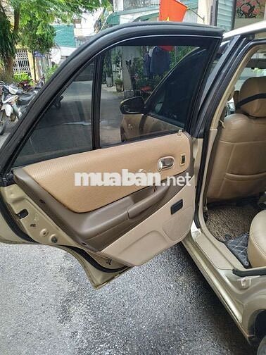 Đổi xe cần bán ford laser 2004 GHIA 1.8 AT.