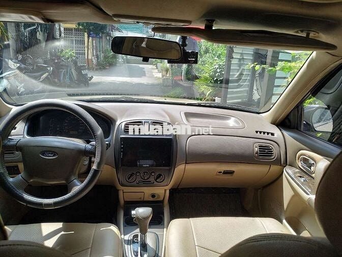 Đổi xe cần bán ford laser 2004 GHIA 1.8 AT.