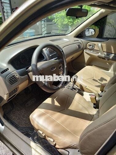 Đổi xe cần bán ford laser 2004 GHIA 1.8 AT.