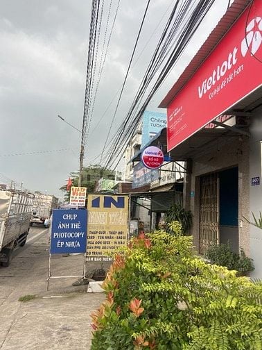 Bán nhà mặt tiền QL1A – vị trí vàng kinh doanh, sổ hồng riêng, giá tốt