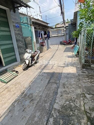 Nhà mặt tiền có 15 phòng trọ phía sau tại Tân Thới Nhất 13 sổ riêng