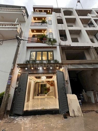 NHÀ XÂY MỚI 100% KHU NHÀ LẦU CAO CẤP - DÂN TRÍ CAO - AN NINH 