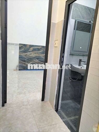 Tôi cần bán nhà Lầu Trệt gần chợ Tân long và ngã ba Ông xã Dĩ An