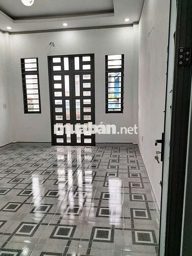 Tôi cần bán nhà Lầu Trệt gần chợ Tân long và ngã ba Ông xã Dĩ An