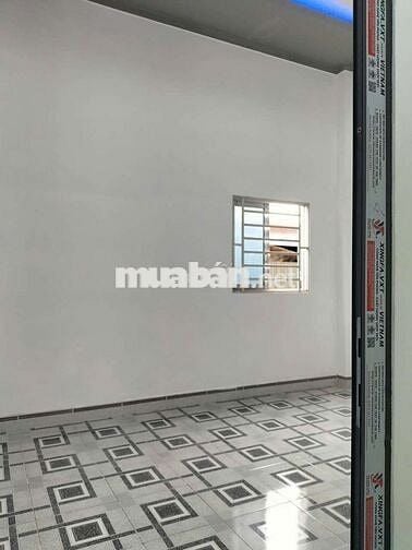 Tôi cần bán nhà Lầu Trệt gần chợ Tân long và ngã ba Ông xã Dĩ An