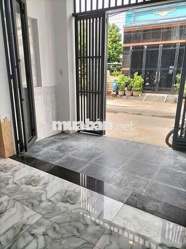 Tôi cần bán nhà Lầu Trệt gần chợ Tân long và ngã ba Ông xã Dĩ An