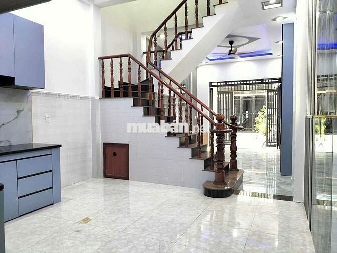 Tôi cần bán nhà Lầu Trệt gần chợ Tân long và ngã ba Ông xã Dĩ An