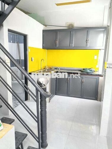 Nhà Lầu Trệt gần chợ Tân long và đường Nguyễn Thị Chạy . Dĩ An