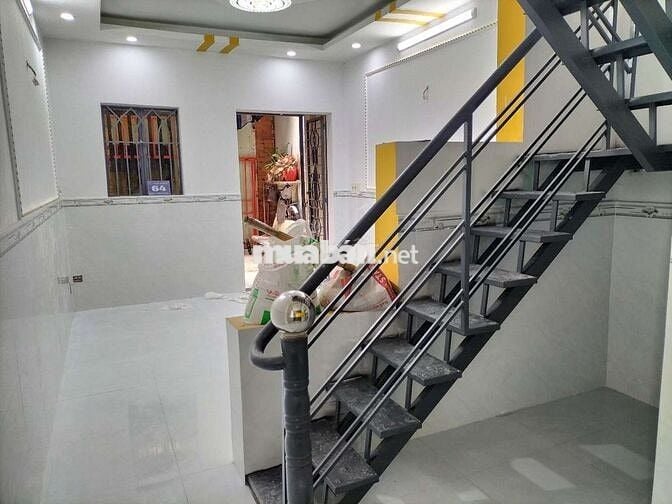 Nhà Lầu Trệt gần chợ Tân long và đường Nguyễn Thị Chạy . Dĩ An