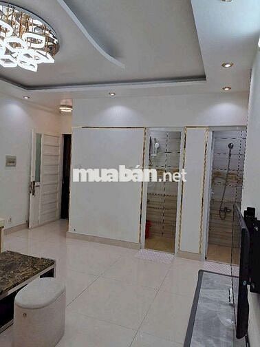 Căn hộ chung cư 312, DT 65m², sổ hồng riêng, view tầng cao thoáng mát