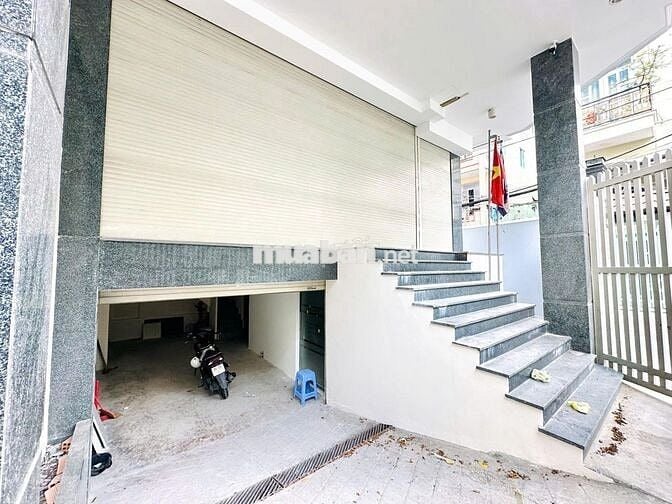 TÒA NHÀ CHO THUÊ NGAY BẠCH ĐẰNG_ HẦM TRỆT 4 LẦU SÀN SUỐT. THANG MÁY