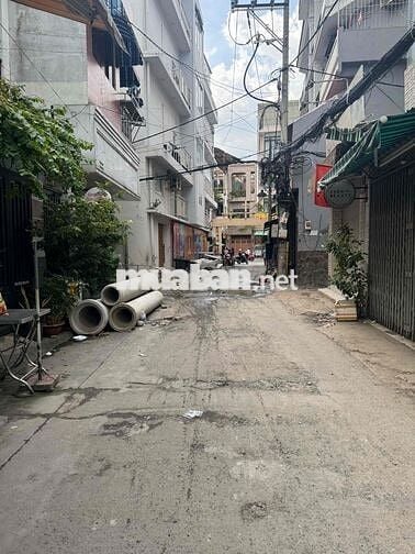 NHÀ 2 TẦNG. 60M2 NGANG 5M NỞ HẬU. HXH SÁT MT. GẦN CHỢ PHẠM VĂN HAI