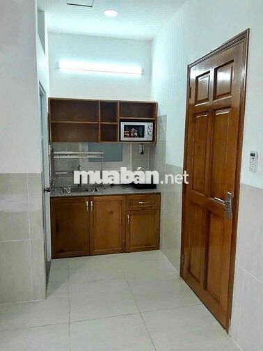 SẮP TRỐNG 4x ngay NGUYỄN TẤT THÀNH toà nhà có THANG MÁY FULL NỘI THẤT