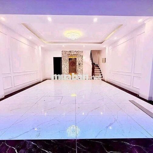 Tu Hoàng -7 tầng thang máy -ô tô đỗ cổng -full nội thất - nở hậu 7x tỷ