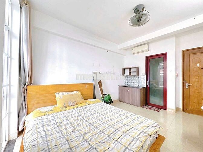 Cho thuê Phòng 30m2 full nội thất ban công đường Phan Chu Trinh gần Q1