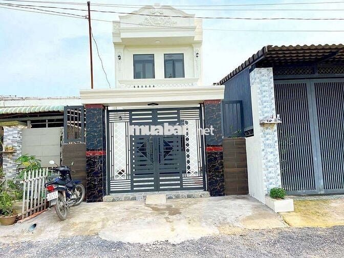 Nhà 1 trệt 1 lầu  gần cầu lớn hóc môn