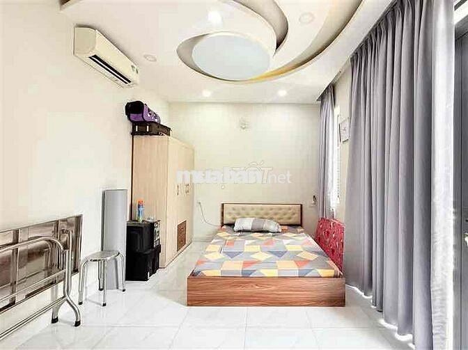 Bán nhà hẻm xe hơi,ngang 5 xây 4 tầng,hơn 10 tỷ,Lê Văn Thọ,Gò Vấp