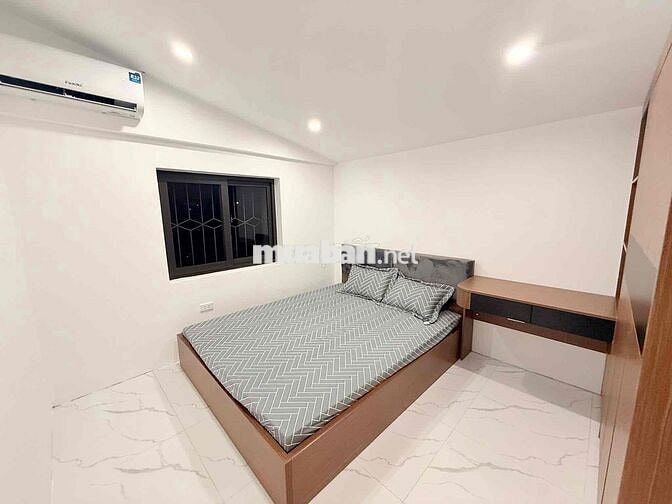 Bán nhà tầng 1 TT Nghĩa Tân , mặt phố KD, ôtô đỗ cửa ,  70m2