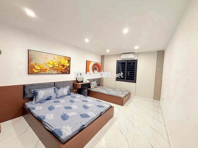 Bán nhà tầng 1 TT Nghĩa Tân , mặt phố KD, ôtô đỗ cửa ,  70m2