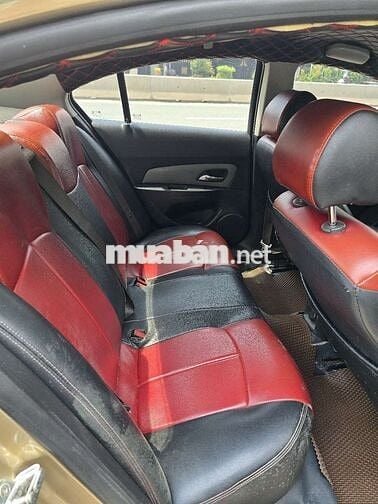 Ô tô Chevrolet Cruze 2011 số sàn màu vàng cát