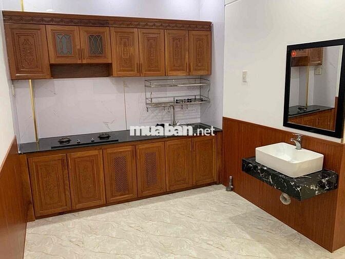 Nhà lầu 4 phòng mới 99% hẻm đường Nguyễn Thông