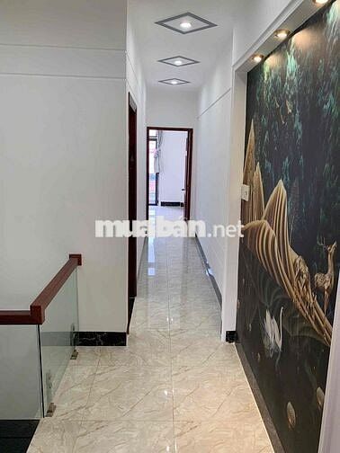 Nhà lầu 4 phòng mới 99% hẻm đường Nguyễn Thông