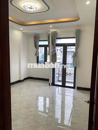 Nhà lầu 4 phòng mới 99% hẻm đường Nguyễn Thông