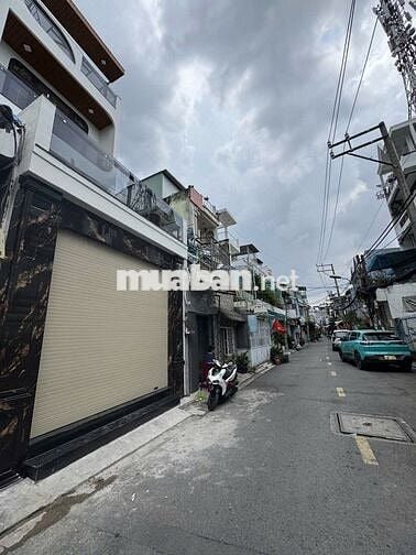 Bán nhà mặt tiền đường, ngay bến xe miền tây 4 tầng 5pn, đường rộng 7m