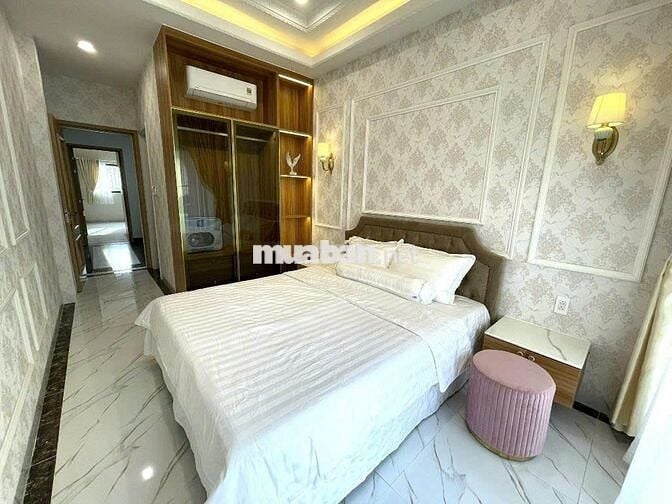 Bán nhà Phan Văn Trị đối diện Vincom 55m, 5 tầng BTCT, chân dài 18m.