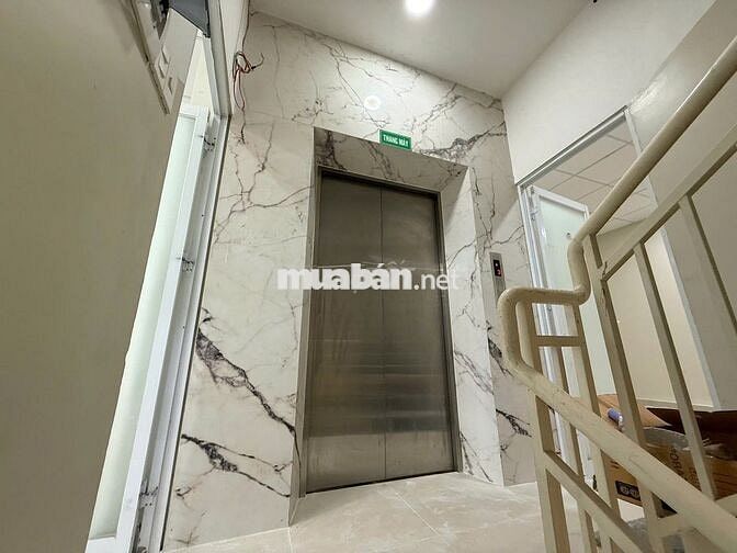 NHÀ ĐẸP ỐP KÍNH -31E Hoàng Hoa Thám P12 Q.TB - 6 x 20m có thang máy