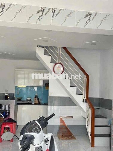 nhà mặt tiền giữ sổ hồng chính 1 trệt 1 lầu 2 phòng ngủ 2 tolet