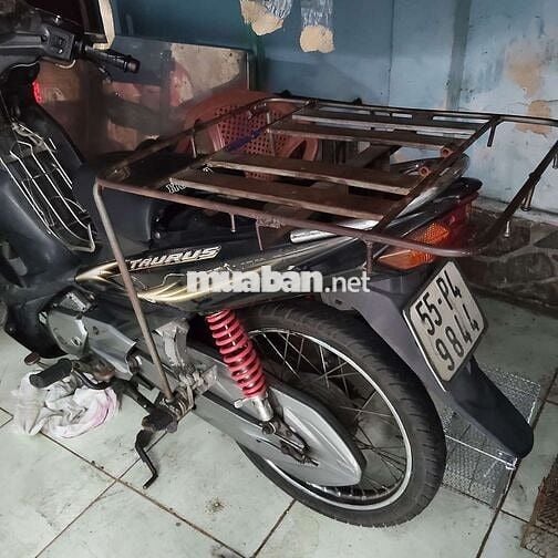 Xe máy Yamaha Taurus màu đen số sàn