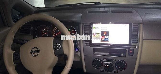 Ô tô Nissan Tiida màu vàng cát, xuất xứ Nhật