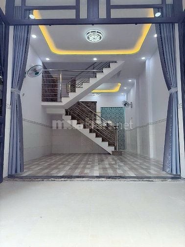 Bán nhà Hóc Môn 4 x 12 đúc trệt lầu 2PN, ngay sân banh Thới Tứ